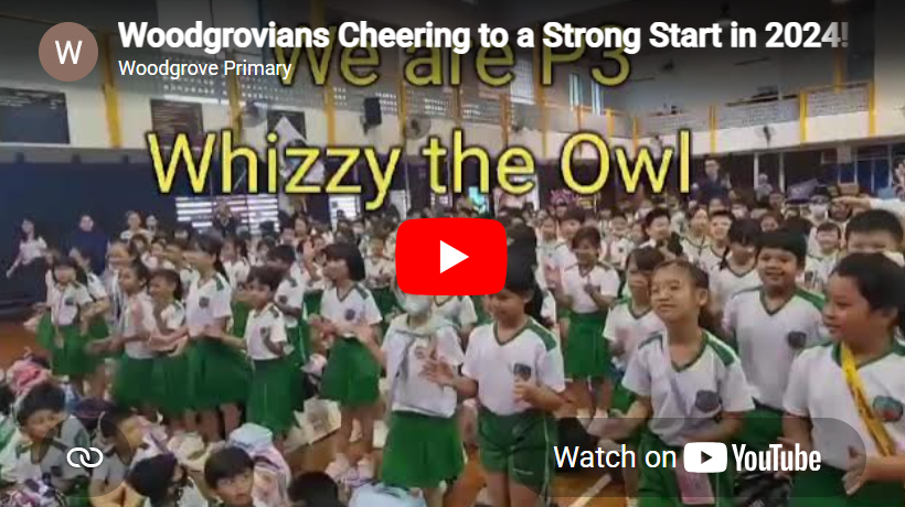 Schoolchildren in white-and-green uniforms cheer in a gym as large text reads Whizzy the Owl
